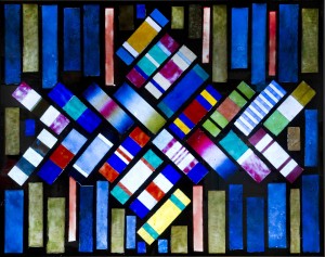 Multi-coloured glass window with geometric shapes