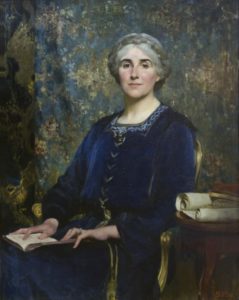 A painting of a woman in a blue dress sat against a dark green background 
